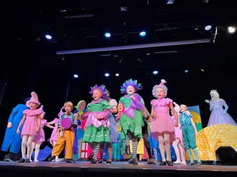 a group of children on a stage