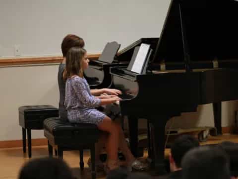 a person playing a piano