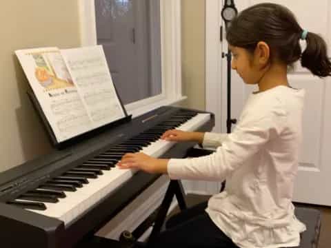 a person playing a piano