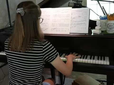 a person playing a piano