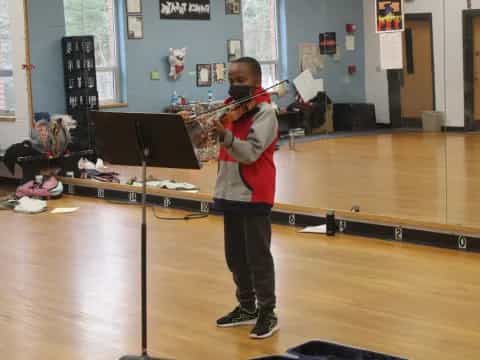 a person playing a violin