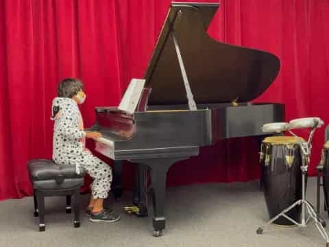 a person playing a piano