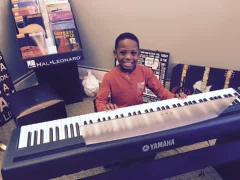 a person playing a piano