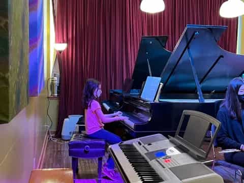 a person playing a piano