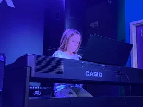 a person sitting at a computer