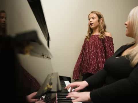 a person playing a piano