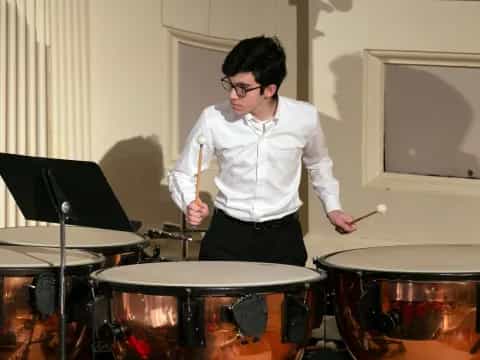 a person playing drums