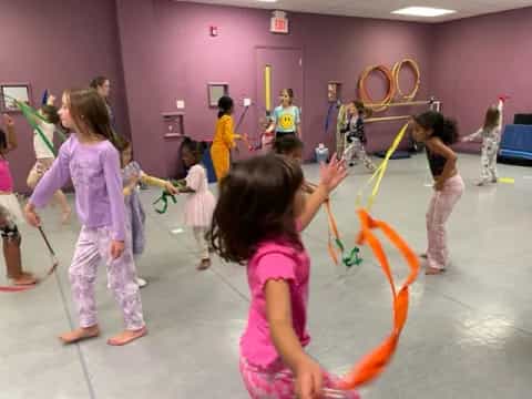 a group of children dancing