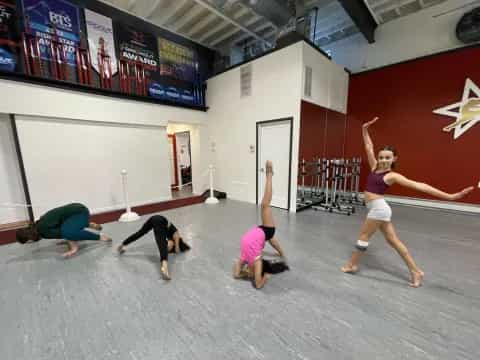 a group of people doing yoga