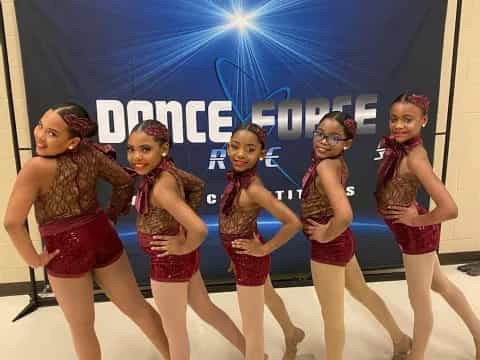 a group of girls in a line