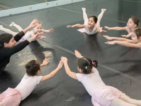 a group of women doing yoga