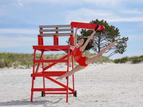 a man lying on a chair