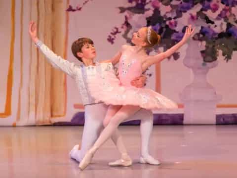 a man and woman dancing