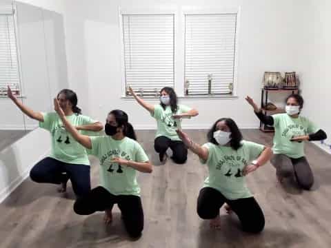 a group of people wearing masks