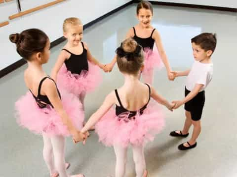 a group of children dancing