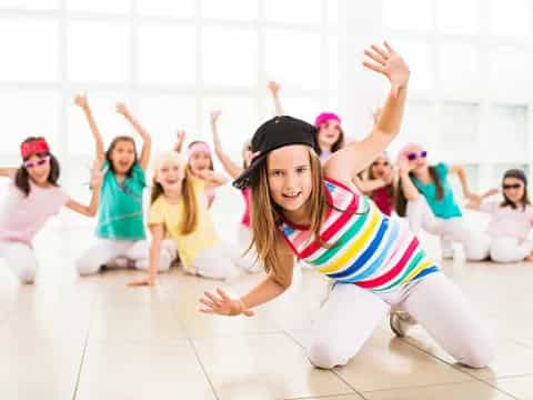a group of girls in a room