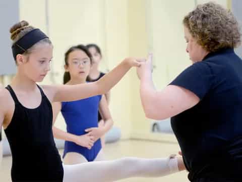 a woman doing a yoga pose