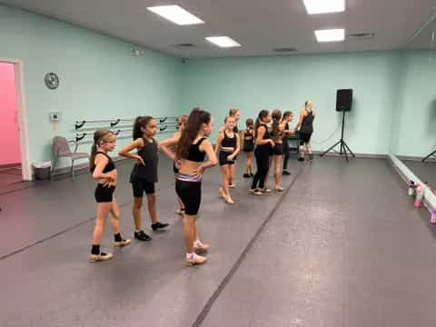 a group of women in a gym