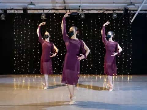 a group of women on a stage