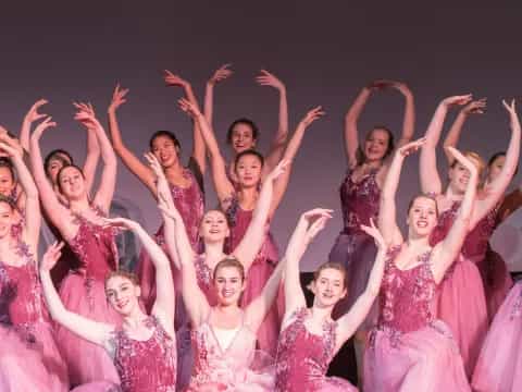 a group of women in dresses
