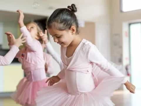 a group of girls in a room