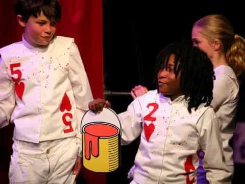 a group of people holding a sign