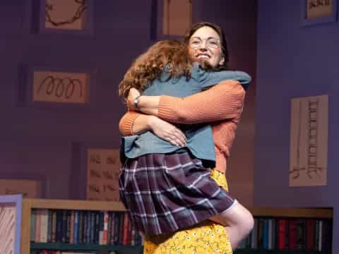 a woman holding a man