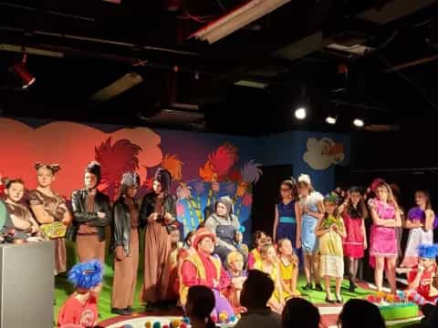 a group of people on a stage