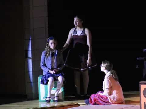 a group of girls on a stage