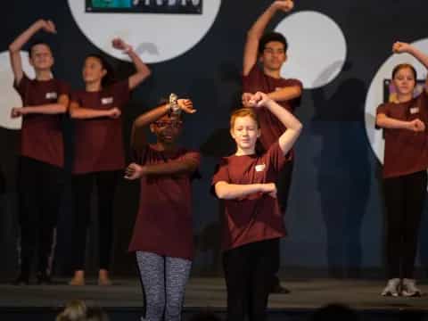 a group of people on a stage