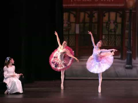 a group of women dancing on a stage