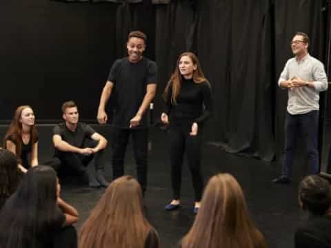 a group of people on a stage