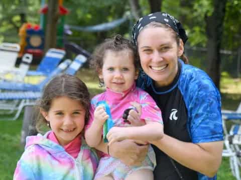 a person and two girls