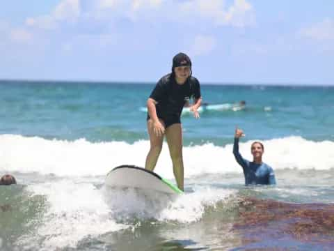 a man riding a surfboard