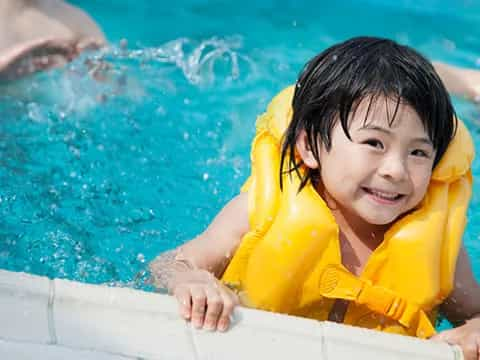 a child in a pool