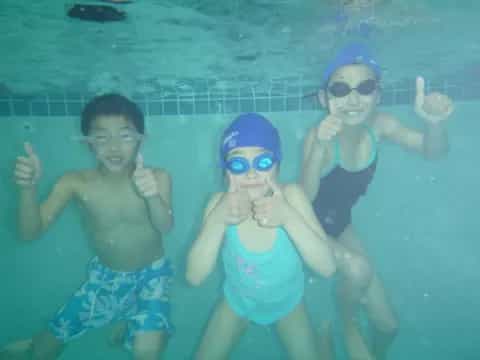 a group of people in a pool