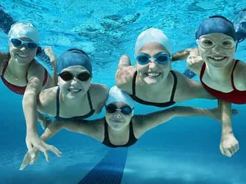 a group of people in a pool