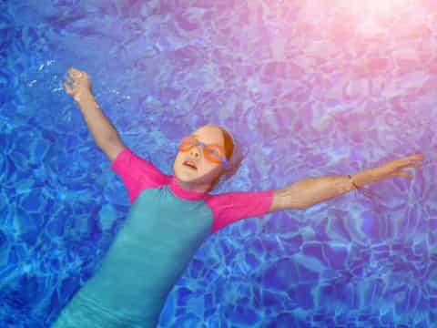 a person lying on a bed