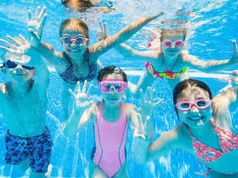 a group of people in a pool