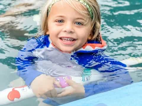 a child in a pool