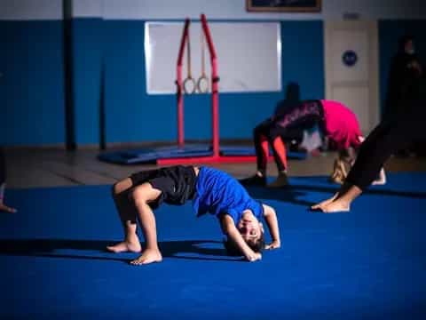 a group of people doing yoga