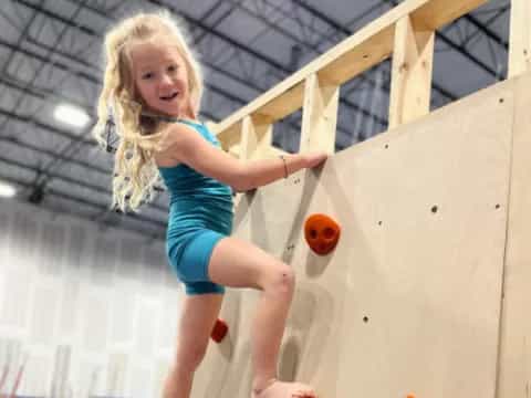 a girl in a blue dress