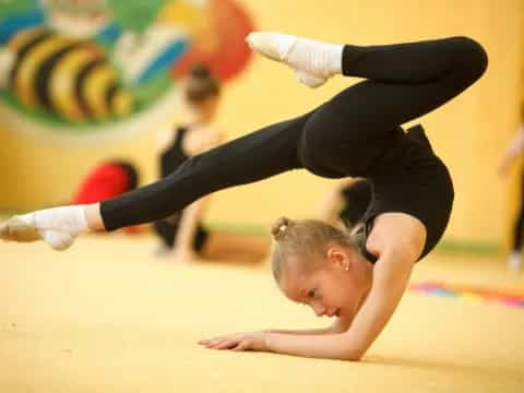 a person doing a plank on the floor