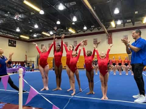 a group of people in a gym