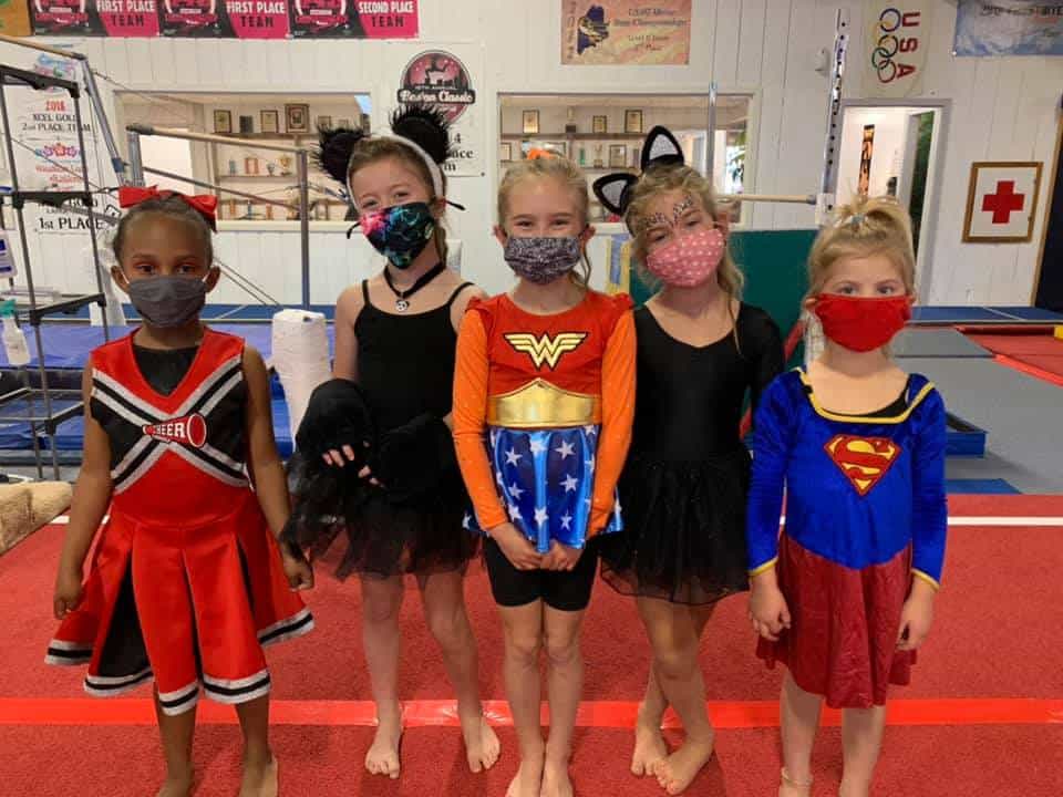 a group of children wearing clothing