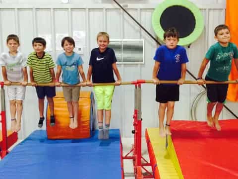 a group of boys in a gym