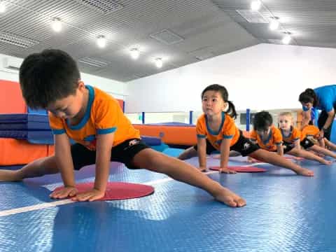 a group of children exercising