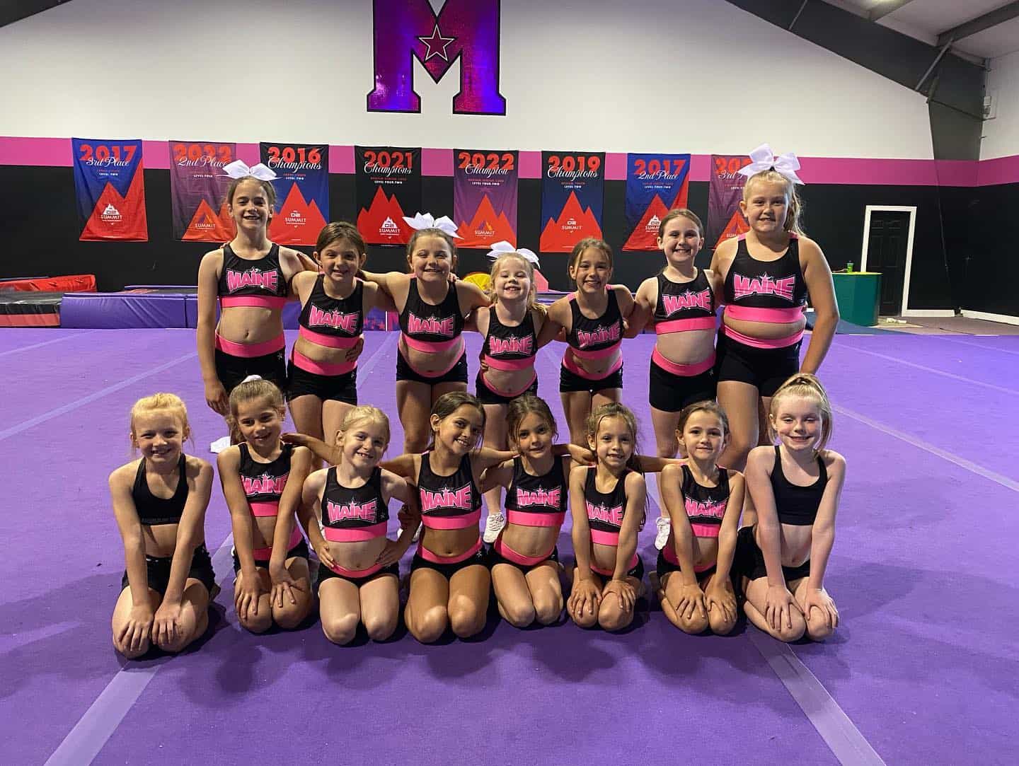 a group of women in athletic wear