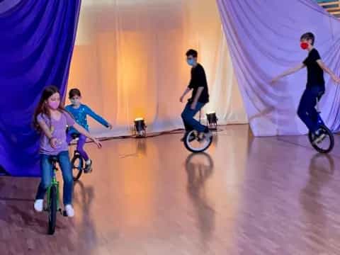 a group of people riding bikes