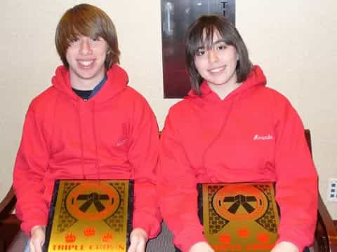 a couple of people holding books